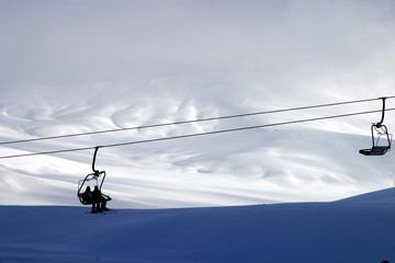 Ski lift carrying skiers in Mount Erciyes, Kayseri, Turkey.