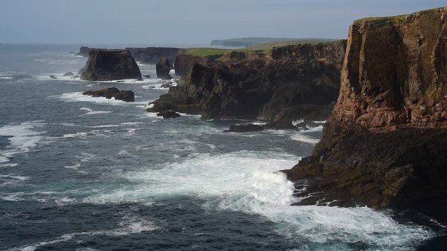 Sea stacks and cliffs at Eshaness / Esha Ness, peninsula in Northmavine on the island of Mainland, Shetland Islands, Scotland, UK