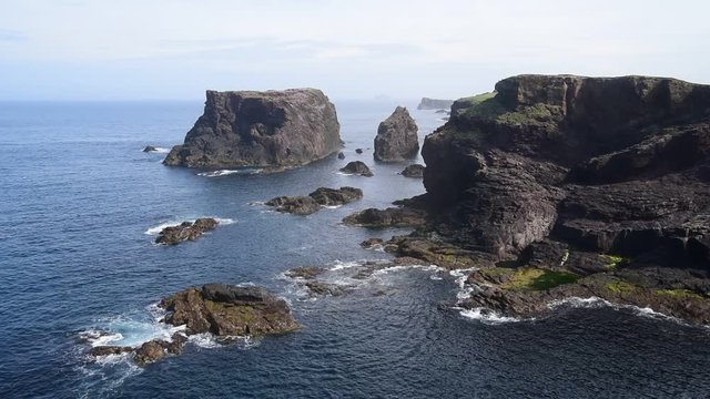 Sea stacks and cliffs at Eshaness / Esha Ness, peninsula in Northmavine on the island of Mainland, Shetland Islands, Scotland, UK