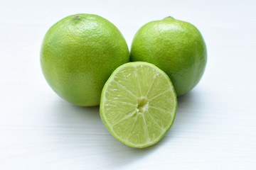 Tahiti lemons, whole and sliced