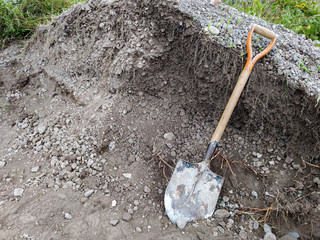 A spade and gravel