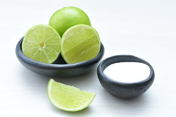 Tahiti lemons, whole, sliced and salt