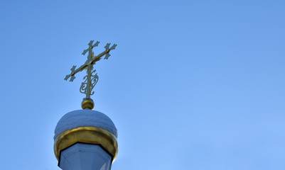 Fototapeta na wymiar cross on blue sky