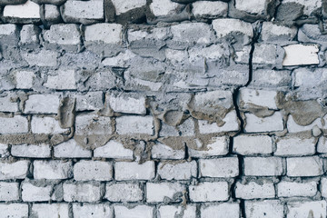 white brickwork, cracked wall