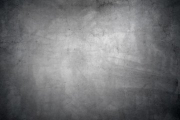 Dark gray concrete texture with vignette as a background