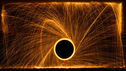 Steelwool spinning under a bridge