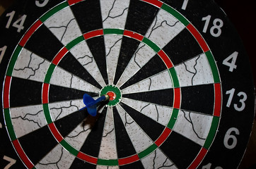 exact hit in the middle of the dart board