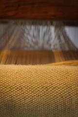 Fototapeta na wymiar weaving loom in rustic wool