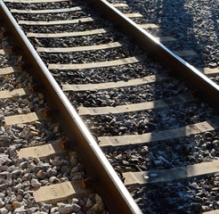 Autumn view of the outgoing railway. Railway or railroad tracks for train transportation.