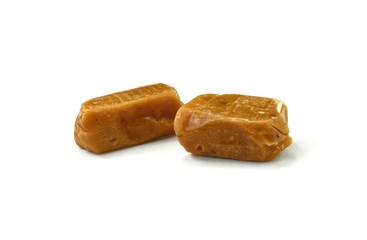 caramel candies isolated on white background