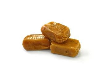 caramel candies isolated on white background