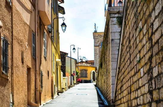 Fototapeta The city of Cannes in France. Beautiful streets and buildings of the old town in the Provence region