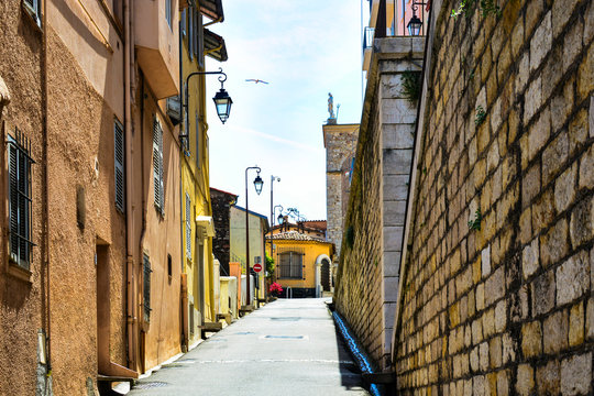 Fototapeta The city of Cannes in France. Beautiful streets and buildings of the old town in the Provence region