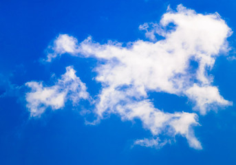 Naklejka na ściany i meble Sunny day, bright blue sky with clouds background for design, decoration or wallpaper