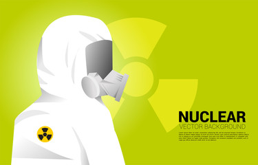 White Hazmat suit with full mask and nuclear background. Concept for radioactive hazard and nuclear protection situation