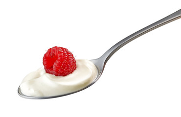 spoon of yogurt cream with raspberry