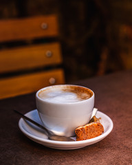 cup of coffee on wooden table