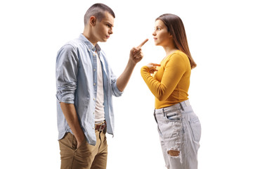 Angry boyfriend scolding his girlfriend with finger