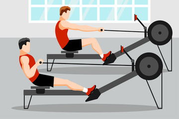 Training athletes on a rowing machine in the gym