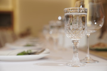 close up to decoration on the luxury dinner table in warm light and cozy mood and tone.