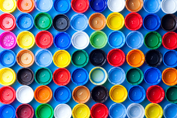 Texture of colored plastic caps. View from above