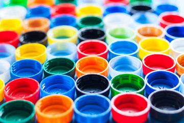 Texture of colored plastic caps. View from above