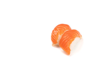 Sushi Salmon, The Japanese traditional food rice ball with fresh salmon fish slice on top. On white clear background with studio light.