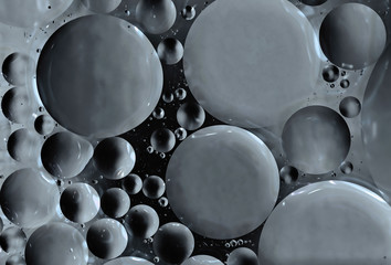 Oil and water abstract spheres in grey