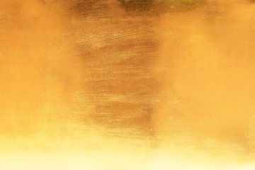 Gold abstract background or texture smooth and gradients shadow. Soft focus