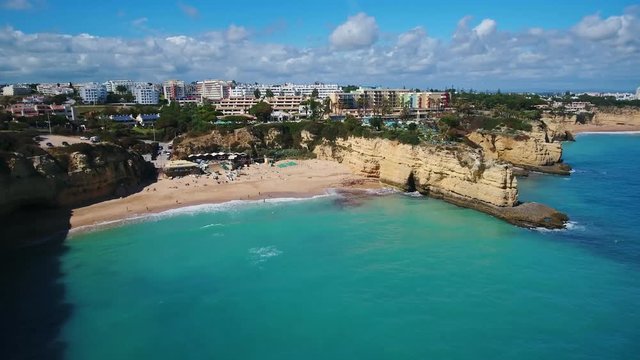 Aerial. Portuguese beach Senhora da Rocha, church on the cape, aerial view. Armacao de Pera Algarve