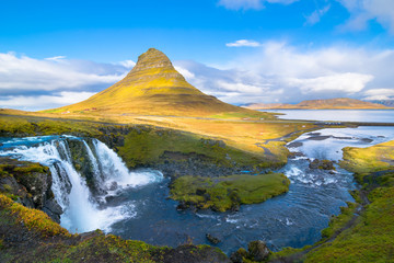 Beautiful view of Kirkjufellsfoss waterfall and Kirkjufell mountain in Snaefellsnes Peninsua - Iceland