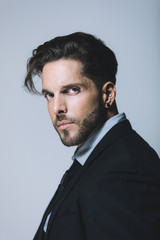 Obraz premium Young bussines man poses for portrait