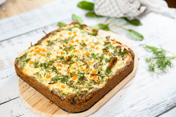 Homemade Cheesy Egg Quiche for Brunch with Vegetables and Eggs