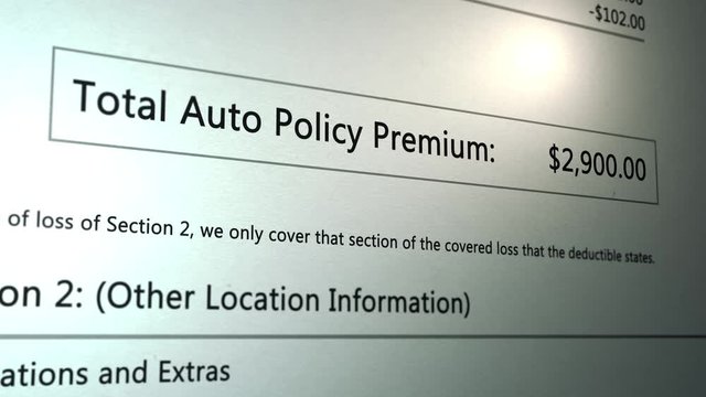 Panning over an Auto Car insurance Deductible Generic Paperwork with high premium  - V1