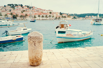 Hvar Old Town Promenade. Sea coast in Dalmatia,Croatia. A famous tourist destination on the Adriatic sea. Old town and marina. © Loginova