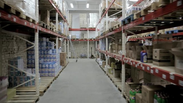 camera movement in a warehouse with household chemicals