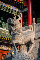 Fototapeta na wymiar Mythical animal dragon and horse sculpture