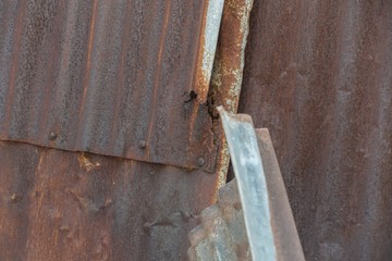 The surface of rusty galvanized steel sheet wall