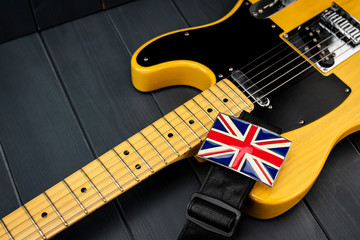 American classic electric guitar with metallic clasp of the British flag 
