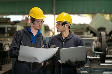 Professional team, quality control, stand maintenance, talk in the Warehouse factory. Team Engineer Factory operator Operating meetings