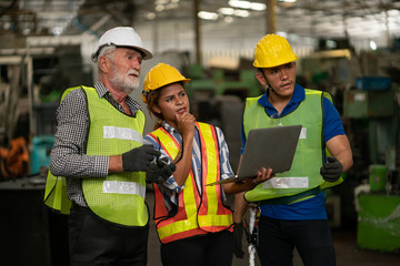 Professional team, quality control, stand maintenance, talk in the Warehouse factory. Team Engineer Factory operator Operating meetings