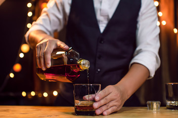 Bartender Serve Whiskey, on wood bar,