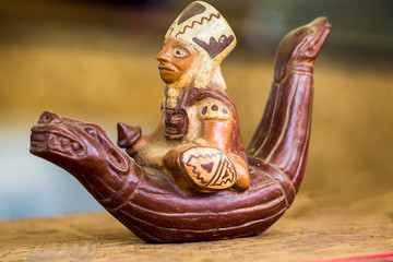 Handicraft from Peru: fisherman on a totora horse