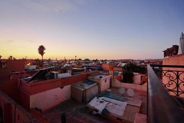 The ancient city at sunset. Old houses in medina of Marakesh, Morocco.