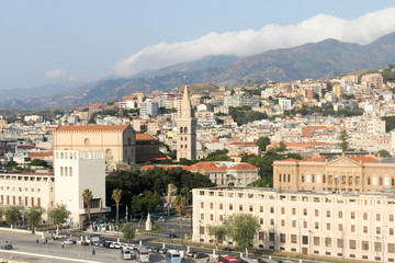 Fototapeta na wymiar View over Messina with the cathedral clock tower in the centre, Sicily, Italy