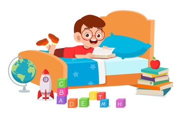 happy cute little kid boy use tablet in room