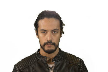 portrait of attractive Latin young in rocker jacket, on white background, with acoustic guitar