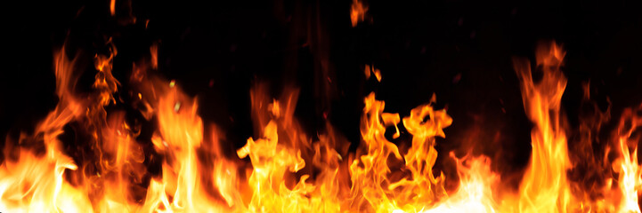 Fototapeta premium Panorama Fire flames on black background. fire burst texture for banner backdrop.