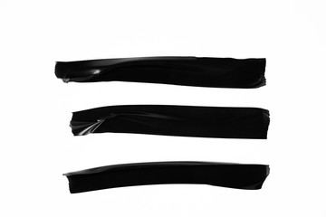 Set of black tapes on white background. Torn horizontal and different size black sticky tape,...
