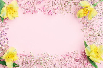 Floral composition. FLowers border frame with  gypsophila and alstroemeria. Flat lay, top view, copy space, mock up.